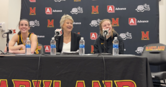 Caitlin Clark, Lisa Bluder and Molly Davis meet with the media following Iowa's 93-85 win over Maryland on Feb. 3, 2024. (Juliet Megdal photo)